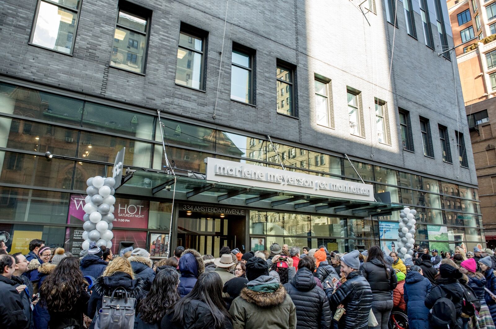 A crowd gathered outside the Marlene Meyerson JCC Manhattan for the unveiling of its renaming in honor of Marlene Nathan Meyerson